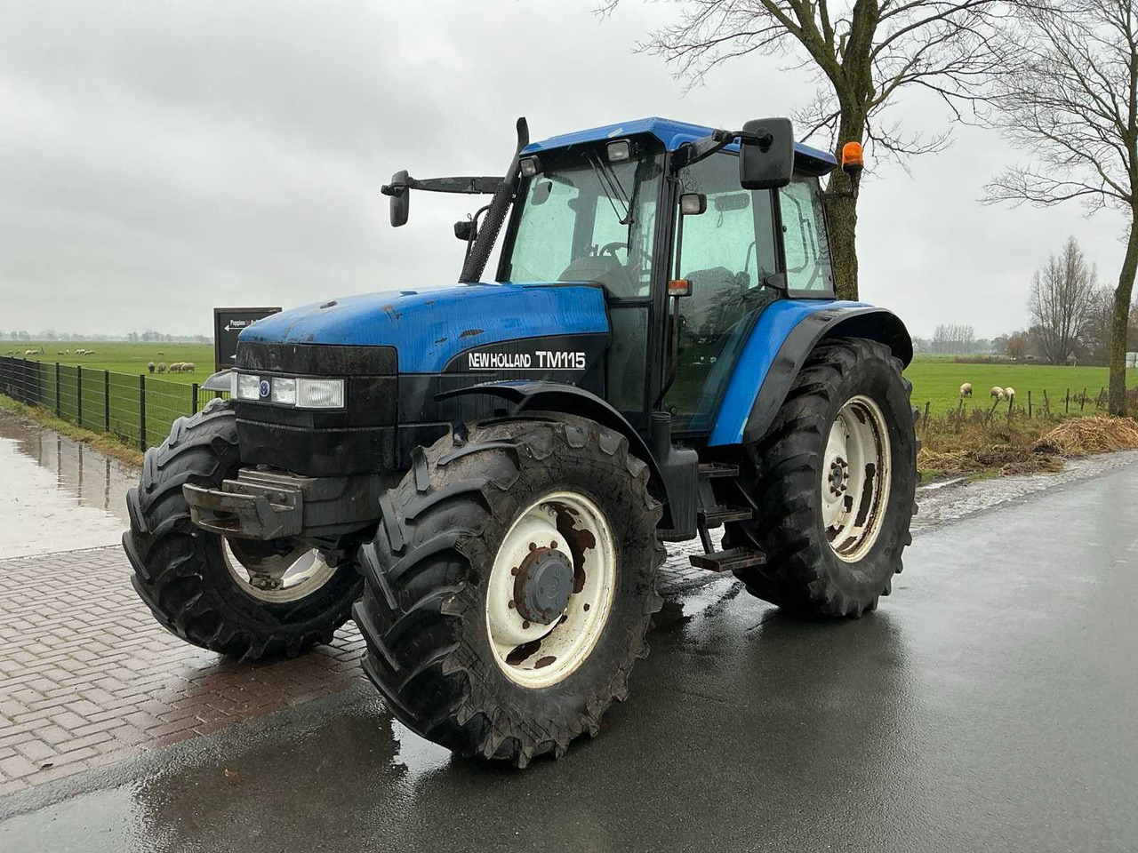 2002 NEW HOLLAND TM 115 ALL-WHEEL DRIVE FARM TRACTOR - Трактор: фото 1 2002 NEW HOLLAND TM 115 ALL-WHEEL DRIVE FARM TRACTOR - Трактор: фото 1