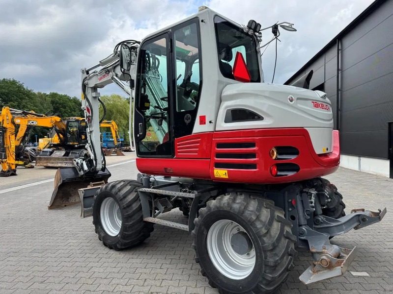 Takeuchi TB295W BJ 2021 3500 uur Compacttilt Draaikantelstuk met Gripper ! - Колёсный экскаватор: фото 3 Takeuchi TB295W BJ 2021 3500 uur Compacttilt Draaikantelstuk met Gripper ! - Колёсный экскаватор: фото 3