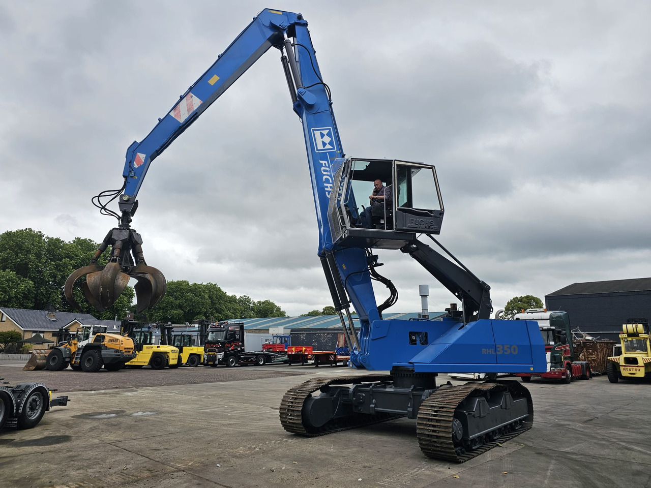 Fuchs RHL 350 Materialhandler With Adjustable Tracks - Перегружатель: фото 1 Fuchs RHL 350 Materialhandler With Adjustable Tracks - Перегружатель: фото 1