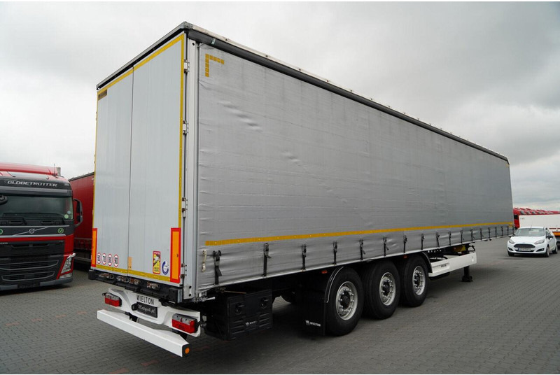 Wielton / FIRANKA / STANDARD / OŚ PODNOSZONA / PLANDEKA ZBROJONA - Тентованный полуприцеп: фото 5 Wielton / FIRANKA / STANDARD / OŚ PODNOSZONA / PLANDEKA ZBROJONA - Тентованный полуприцеп: фото 5