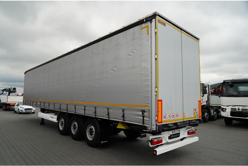Wielton / FIRANKA / STANDARD / OŚ PODNOSZONA / PLANDEKA ZBROJONA - Тентованный полуприцеп: фото 3 Wielton / FIRANKA / STANDARD / OŚ PODNOSZONA / PLANDEKA ZBROJONA - Тентованный полуприцеп: фото 3