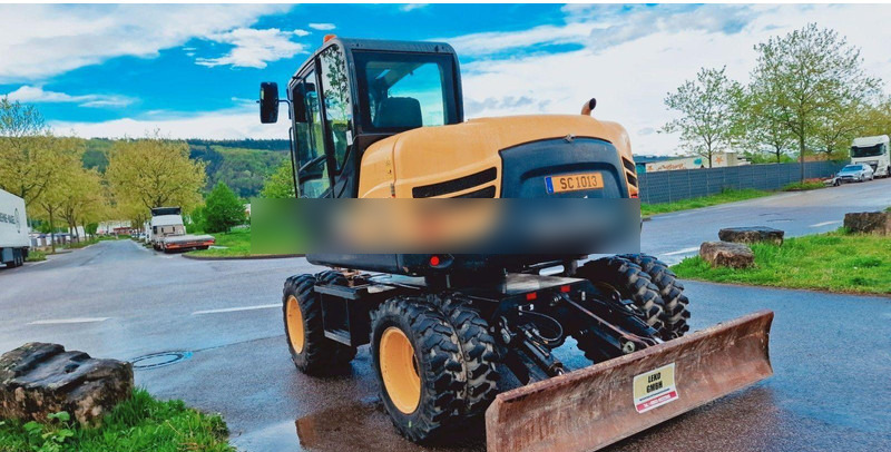 Yanmar B 95W Mit Drei Löffeln und Ein Hammer - Колёсный экскаватор: фото 5 Yanmar B 95W Mit Drei Löffeln und Ein Hammer - Колёсный экскаватор: фото 5