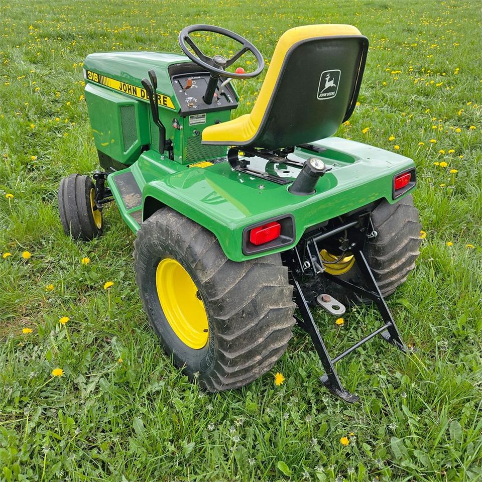 John Deere 318 - Коммунальный трактор: фото 3 John Deere 318 - Коммунальный трактор: фото 3