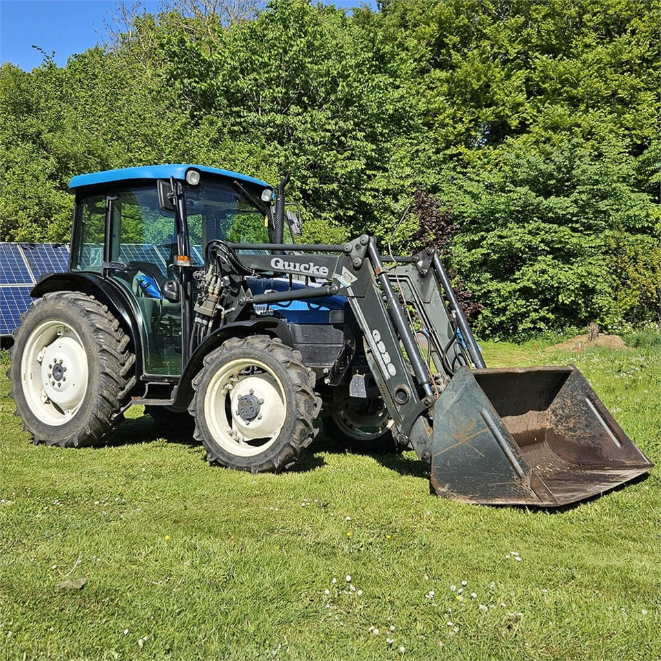 New Holland TN55D - Трактор: фото 1 New Holland TN55D - Трактор: фото 1