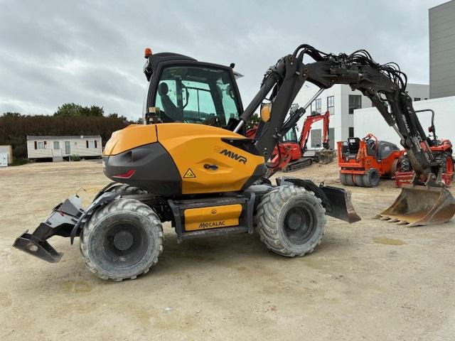 Mecalac 9 MWR - Колёсный экскаватор: фото 2 Mecalac 9 MWR - Колёсный экскаватор: фото 2