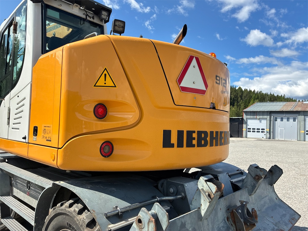 Колёсный экскаватор Liebherr 912 Compact: фото 38