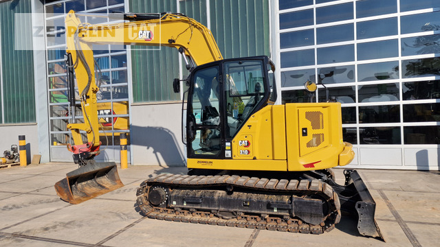 Cat 310 - Мини-экскаватор: фото 2 Cat 310 - Мини-экскаватор: фото 2