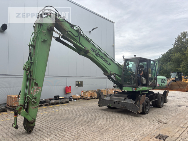 Sennebogen 821 - Перегружатель: фото 1 Sennebogen 821 - Перегружатель: фото 1